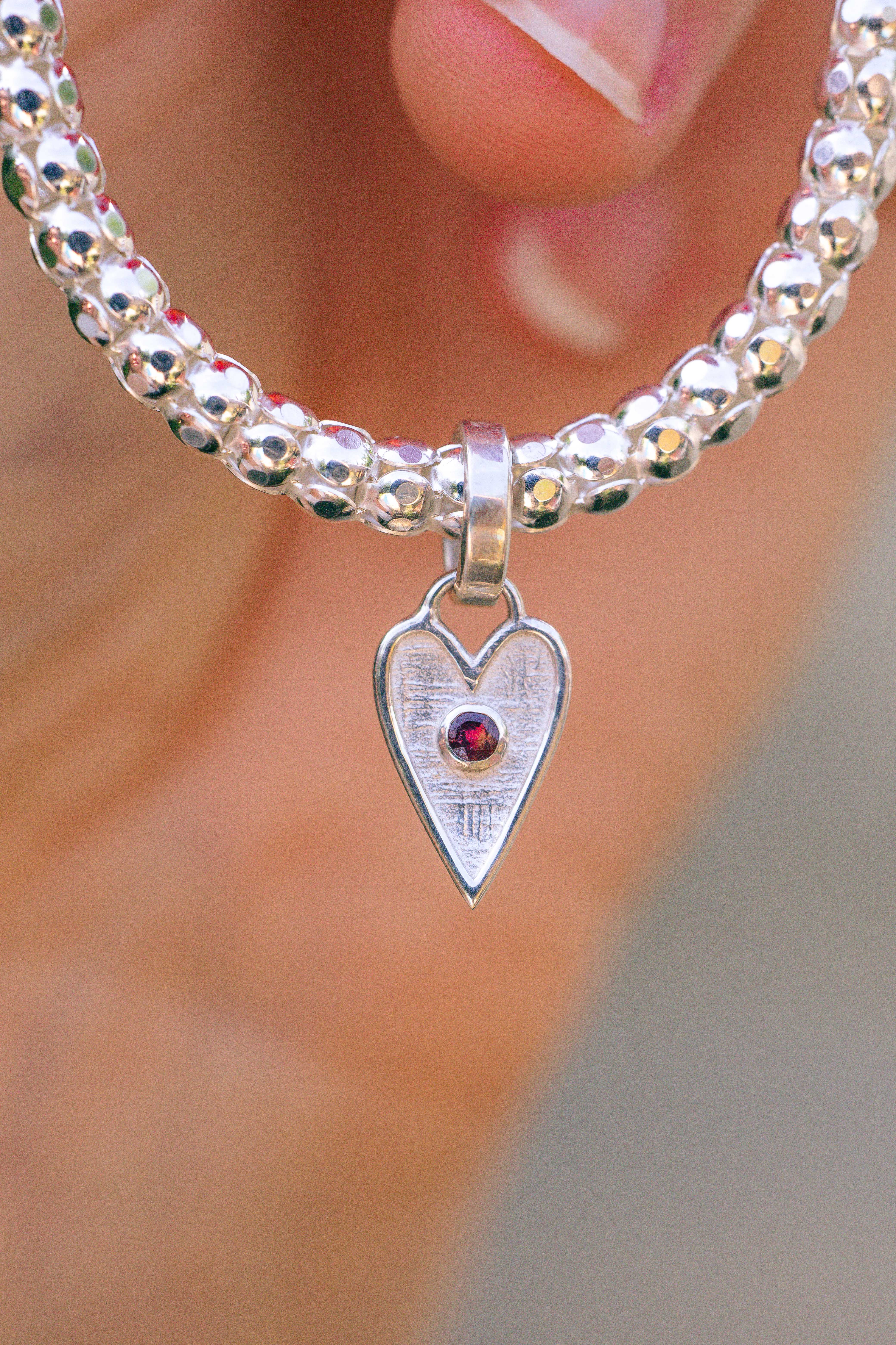 PULSERA CORAZON RUBI