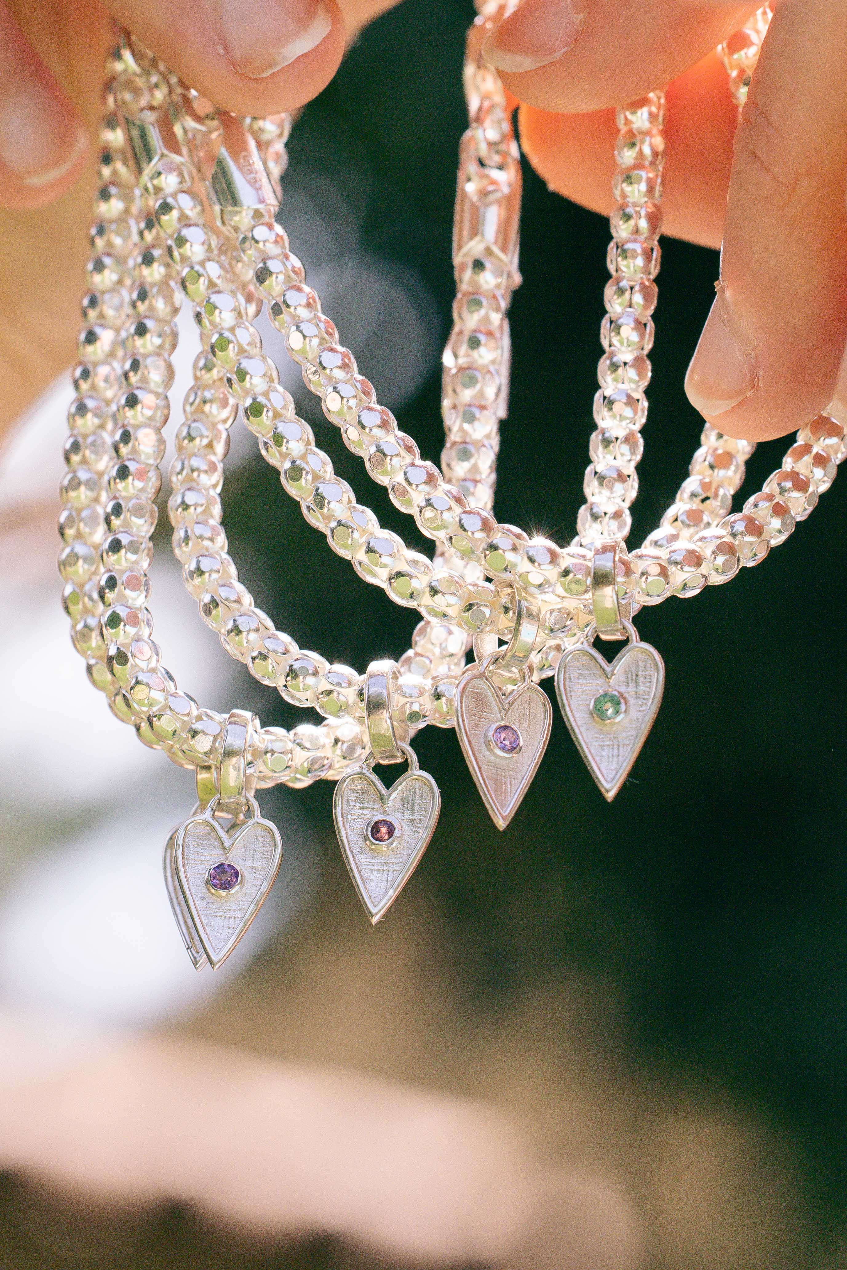 PULSERA CORAZON RUBI
