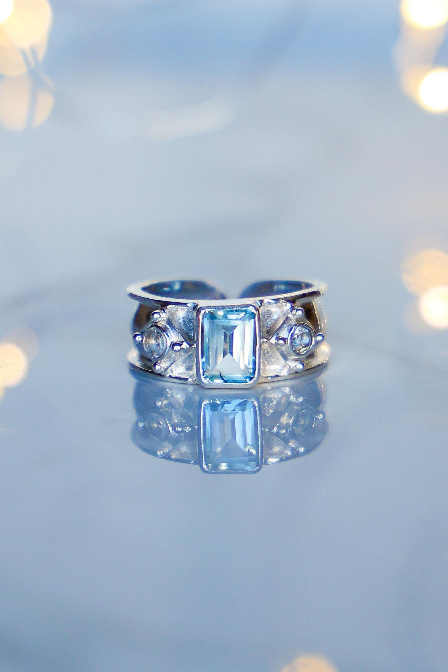 ANILLO AURORA DE PLATA Y TOPACIO CELESTE