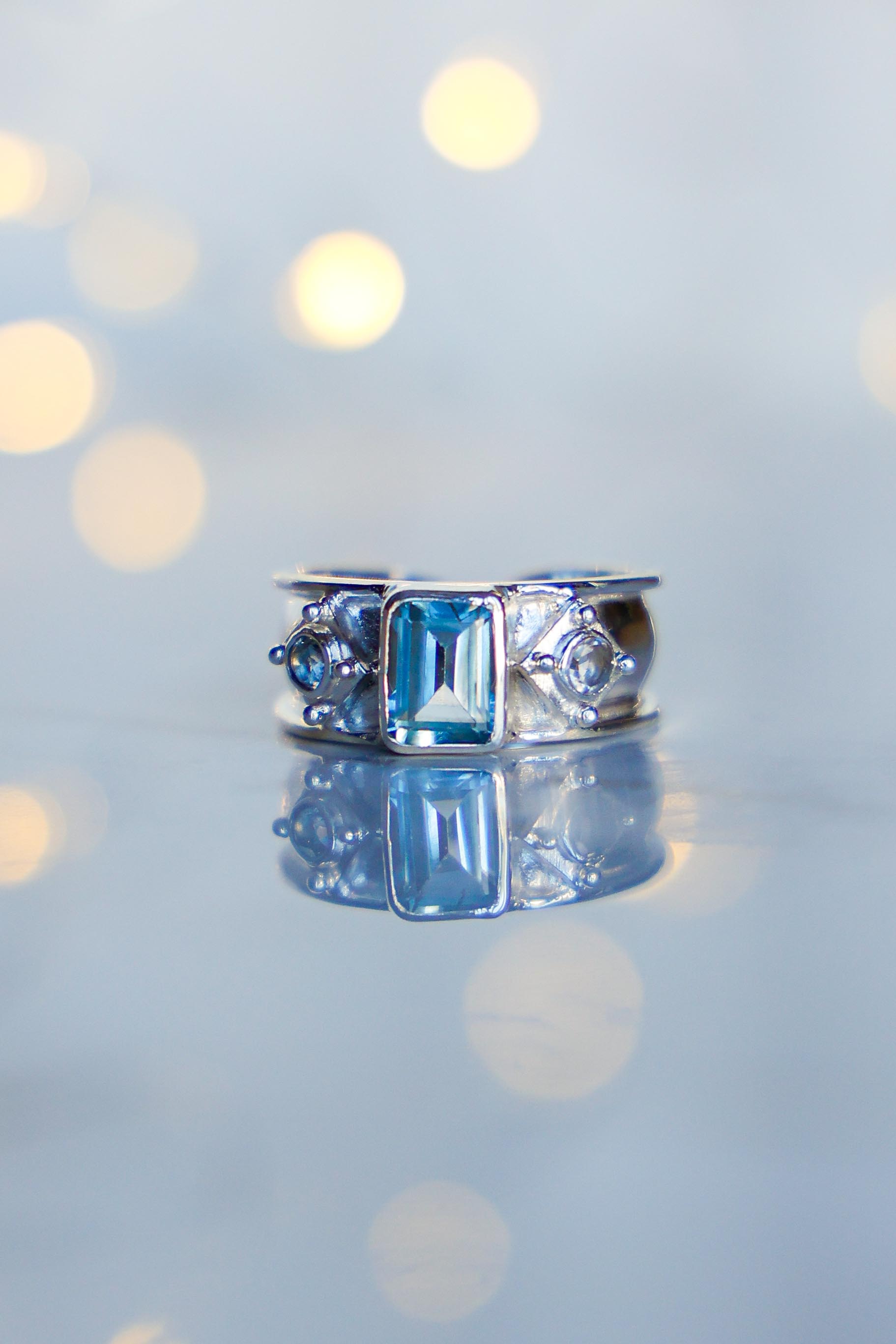 ANILLO AURORA DE PLATA Y TOPACIO CELESTE