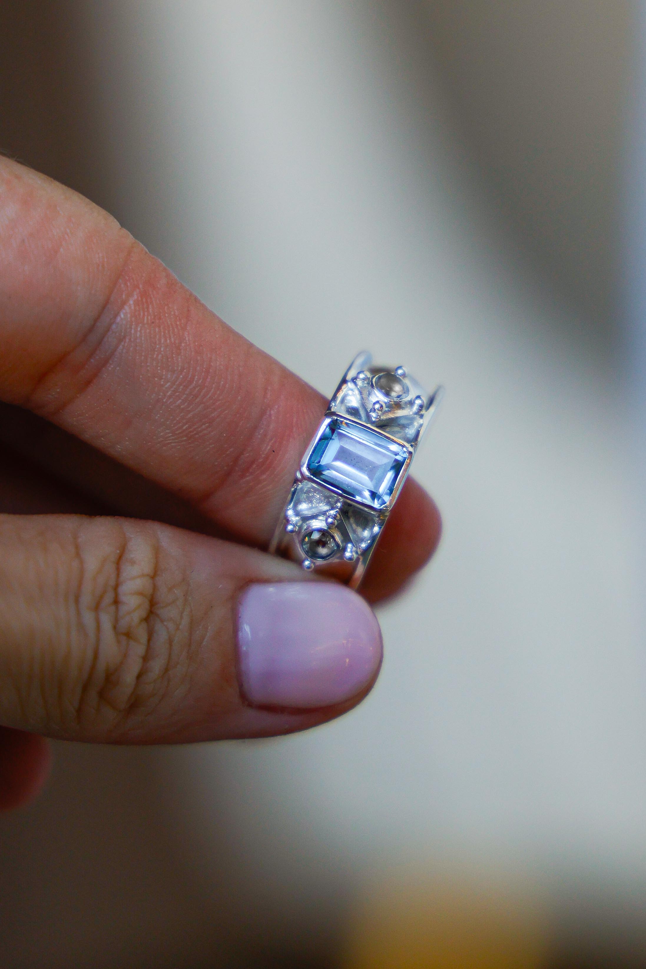 ANILLO AURORA DE PLATA Y TOPACIO CELESTE