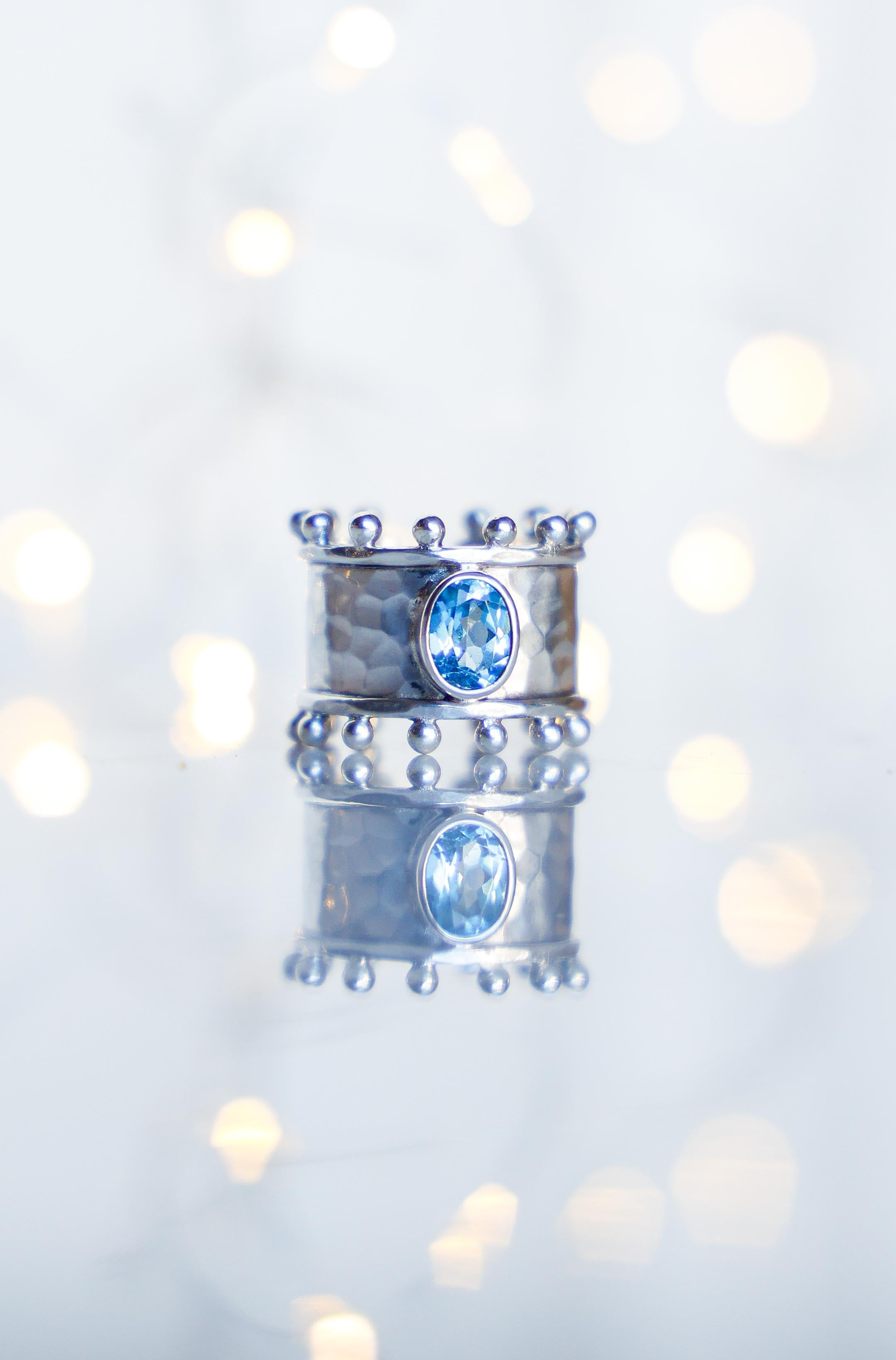 ANILLO ETER DE PLATA Y SWISS TOPACIO CELESTE
