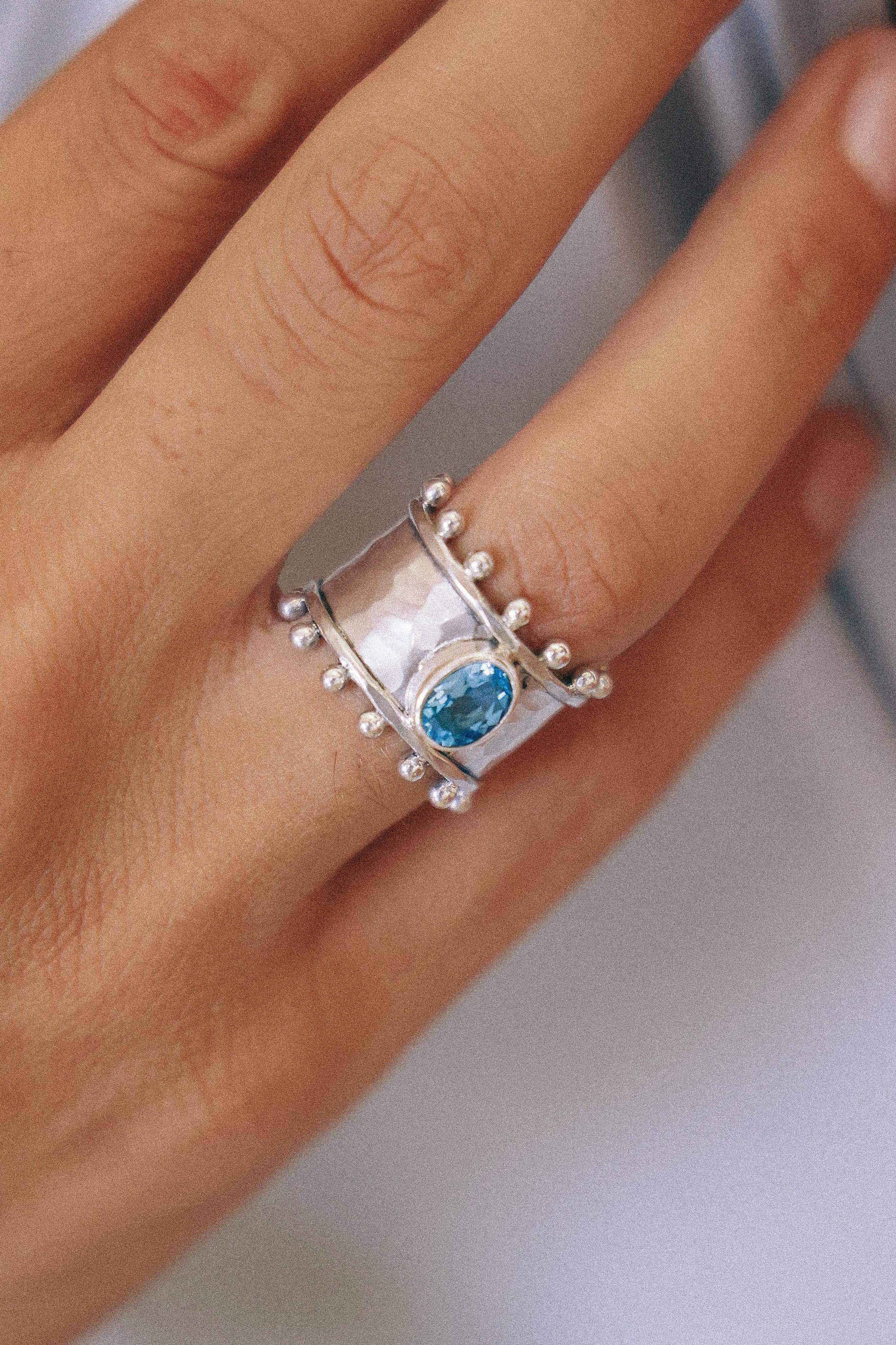 ANILLO ETER DE PLATA Y SWISS TOPACIO CELESTE
