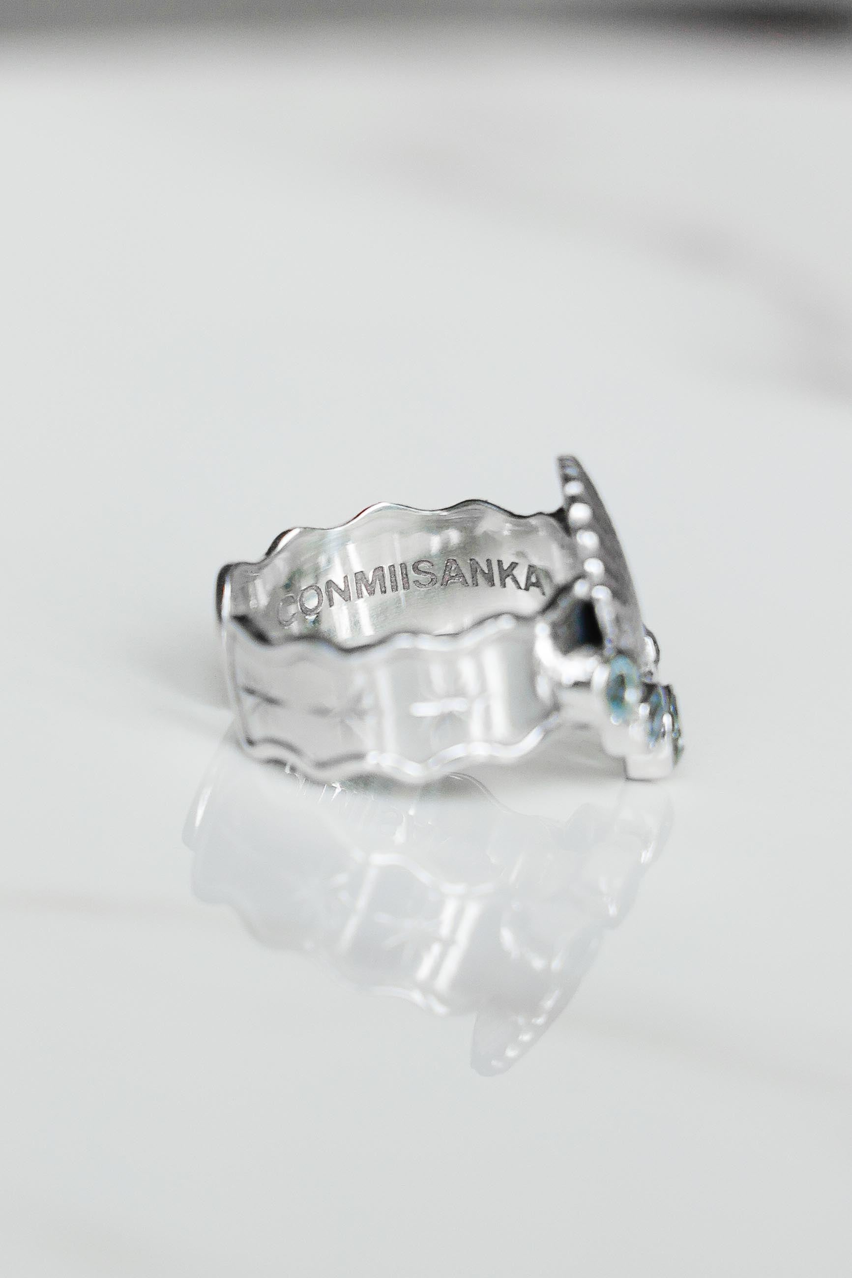 ANILLO CONMIISANKA DE PLATA Y TOPACIO CELESTE
