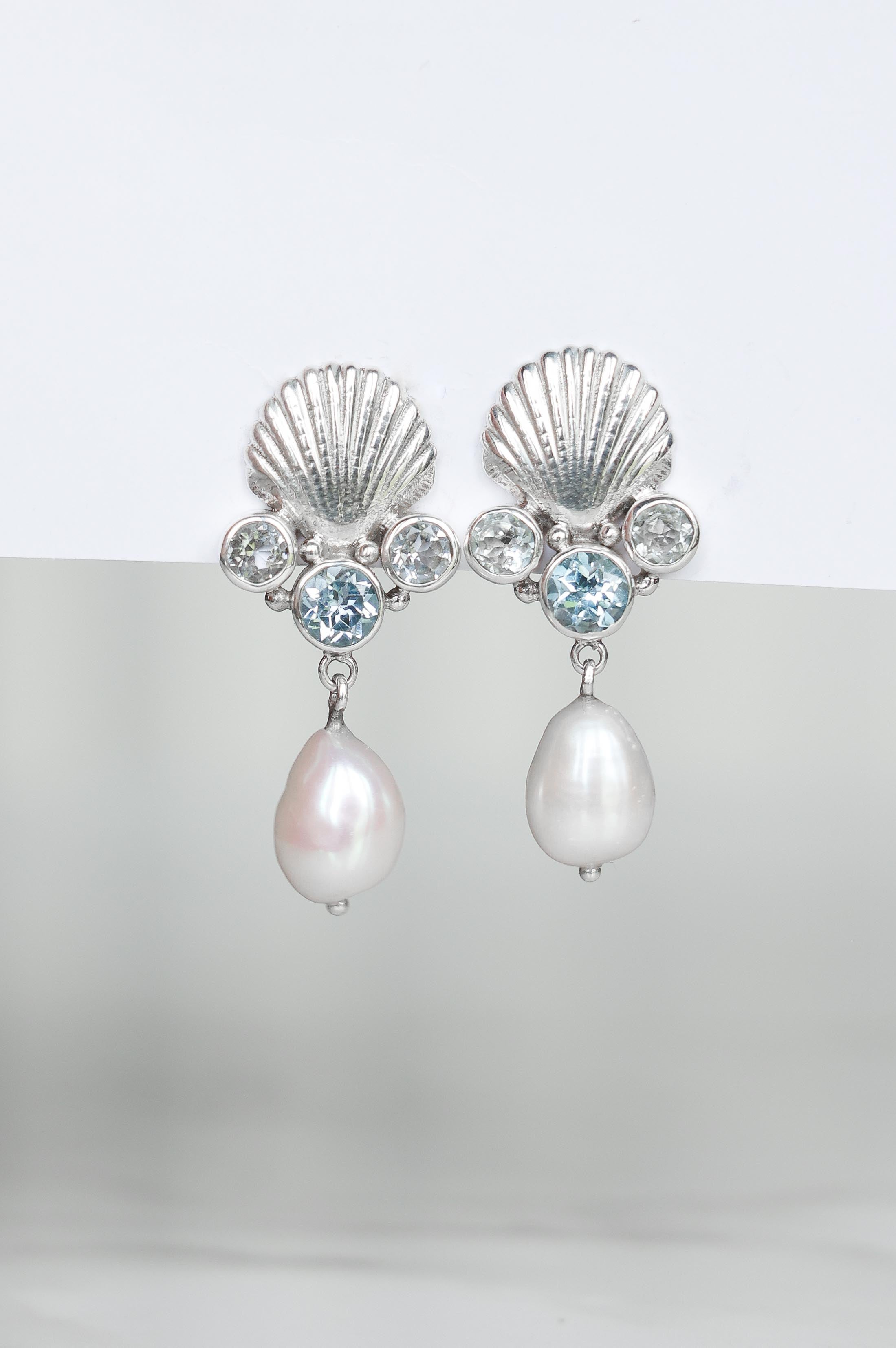 AROS CONMIISANKA DE PLATA DE TOPACIO BLANCO Y CELESTE