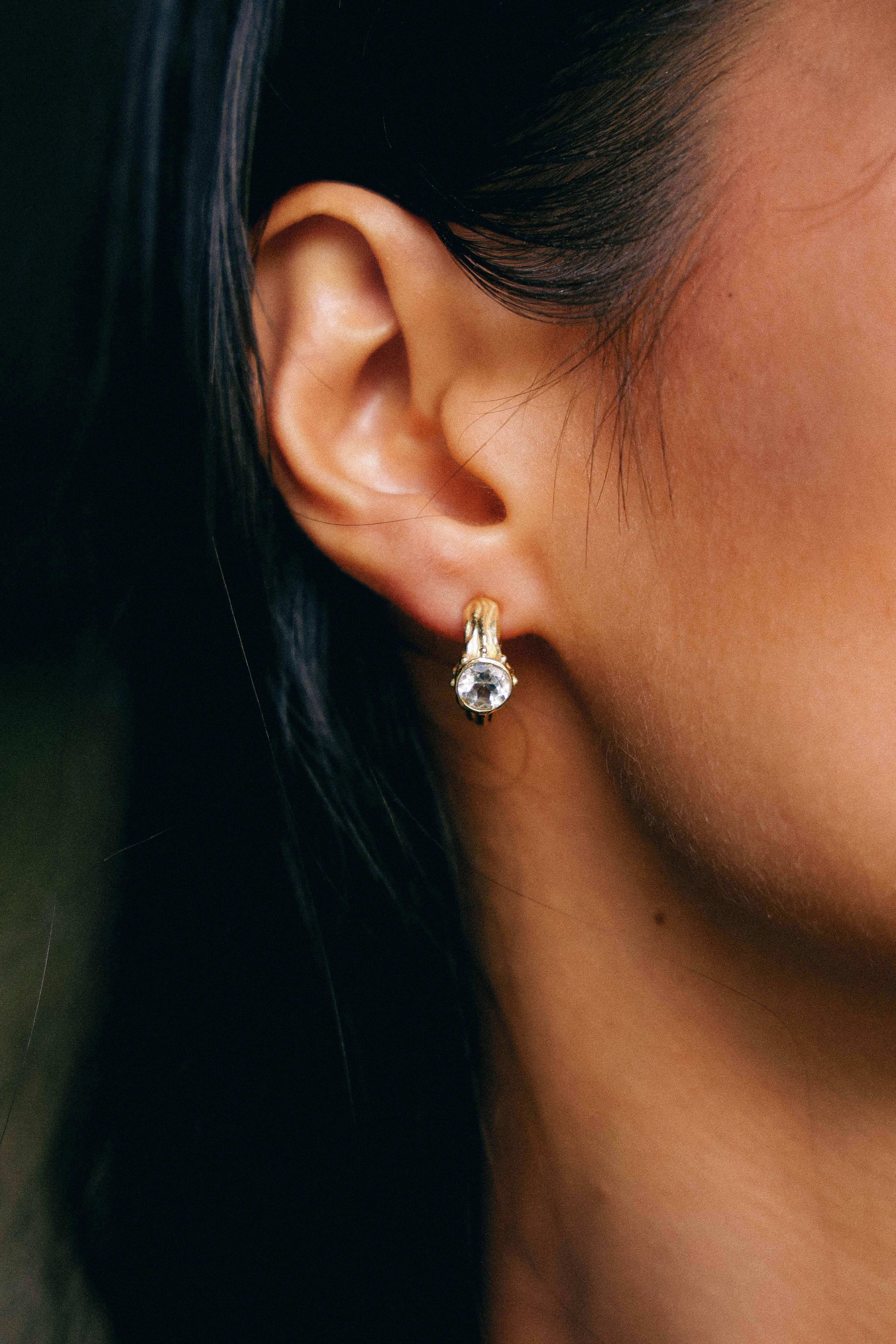 AROS SELES ORO Y TOPACIO BLANCO