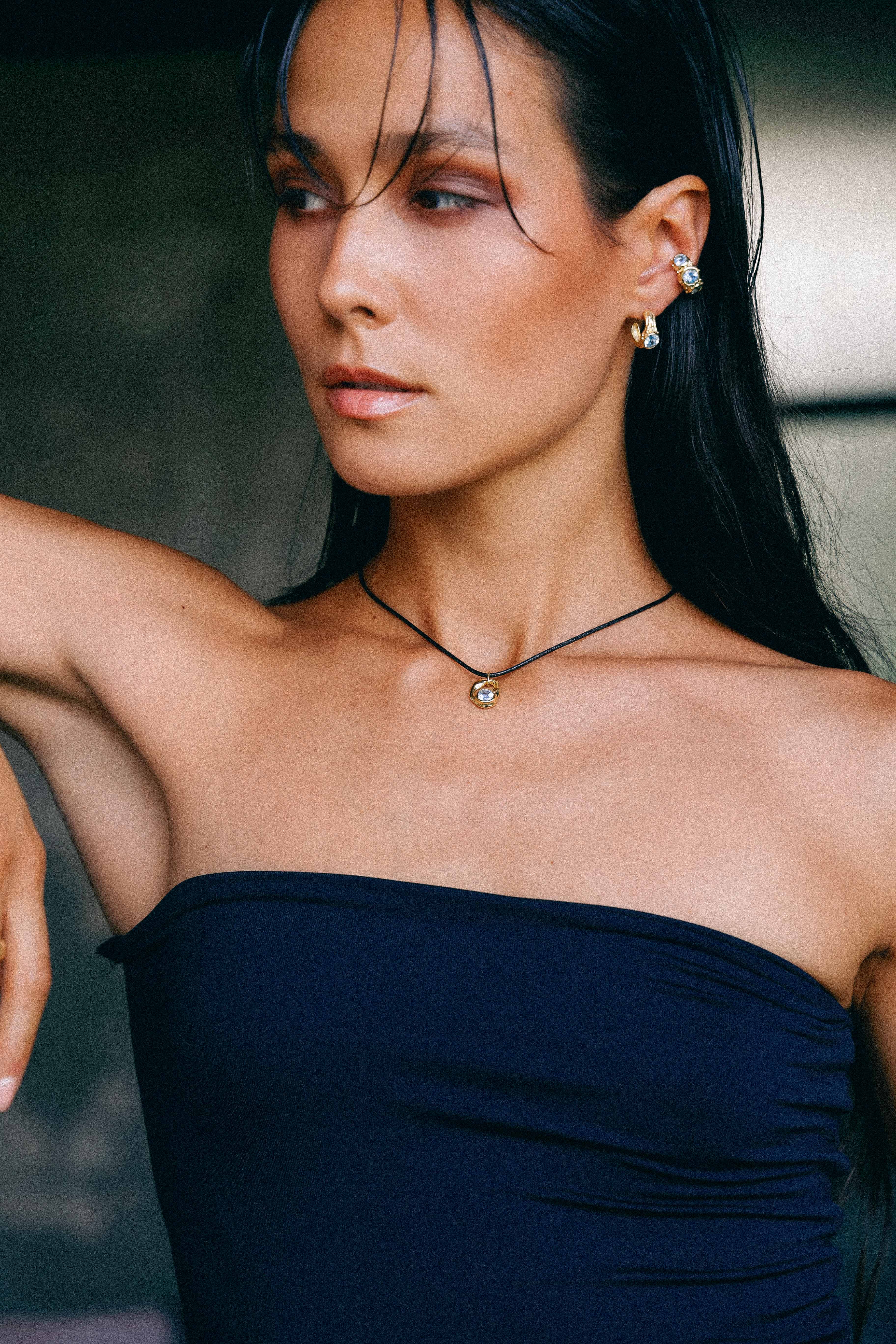 ARO EARCUFF SOLENE ORO Y TOPACIO CELESTE