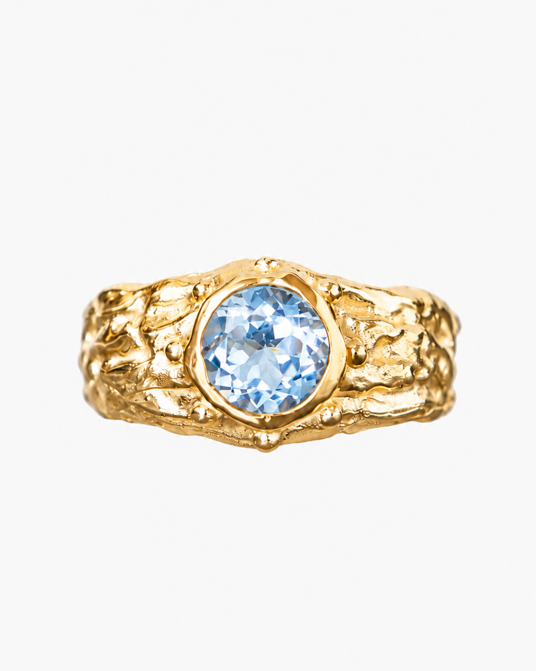 ANILLO SELES ORO Y TOPACIO CELESTE
