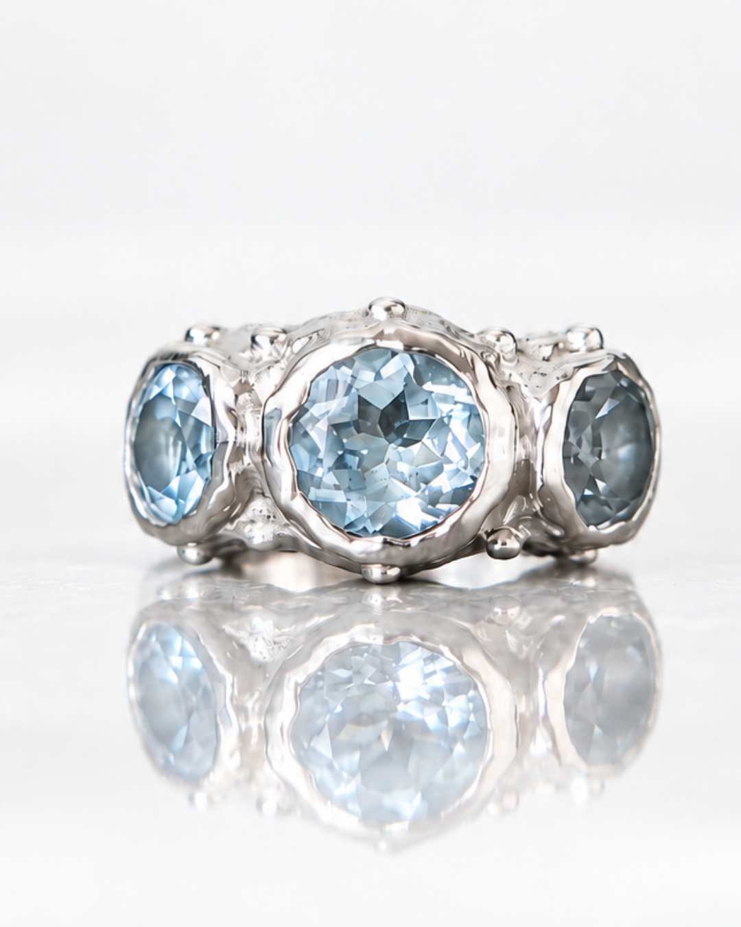 ARO EARCUFF SOLENE DE PLATA Y TOPACIO CELESTE