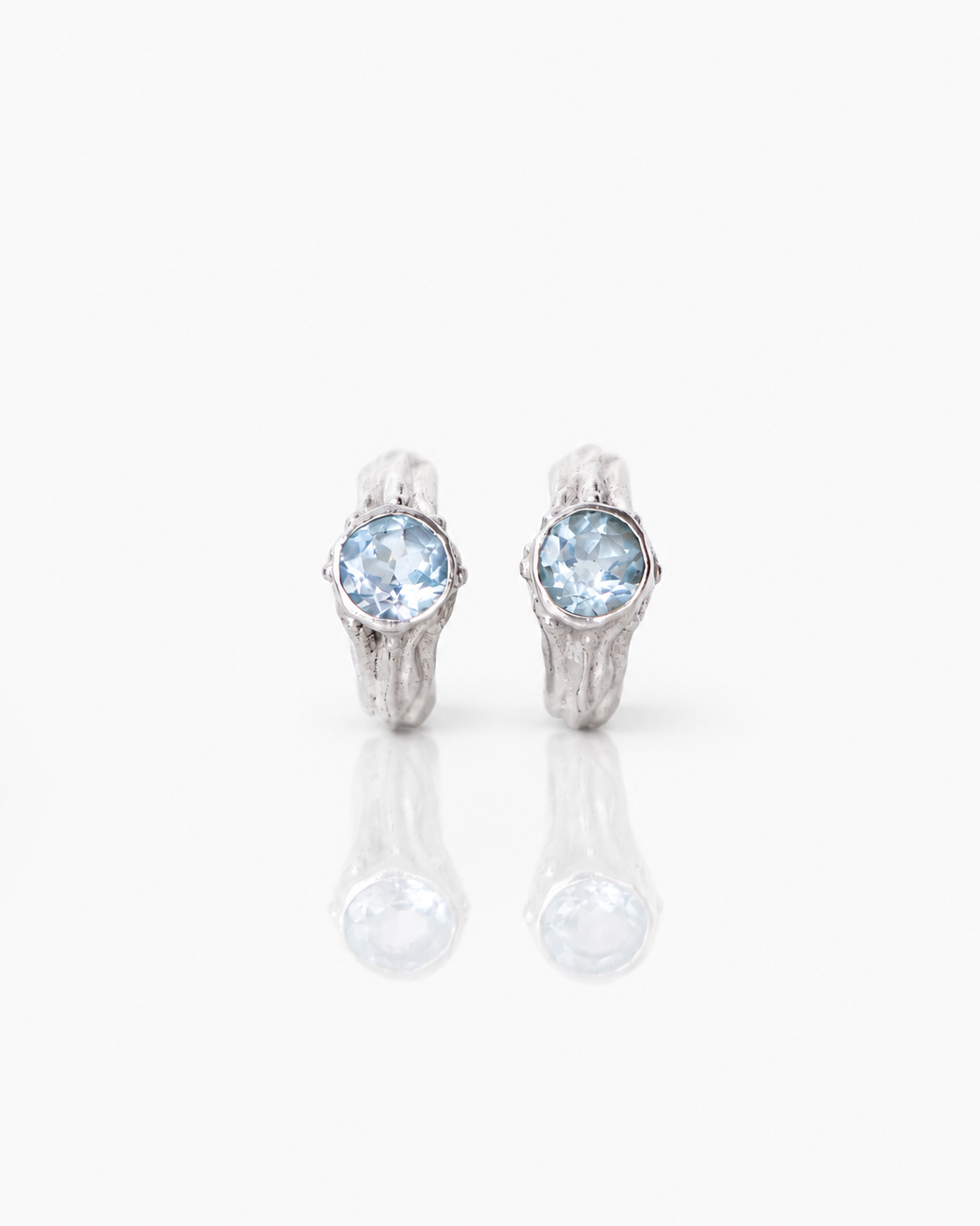 AROS SELES DE PLATA Y TOPACIO CELESTE