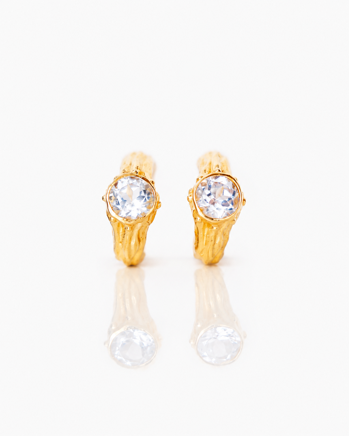 AROS SELES ORO Y TOPACIO BLANCO