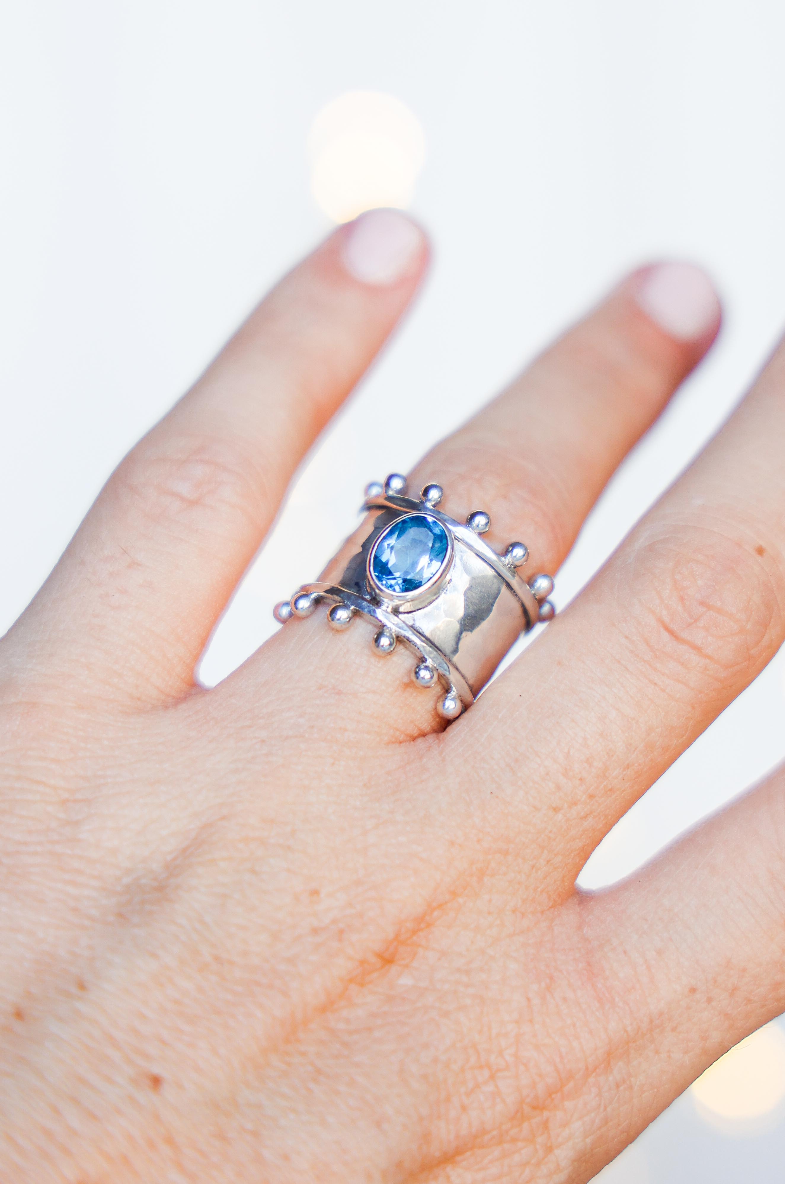 ANILLO ETER DE PLATA Y SWISS TOPACIO CELESTE