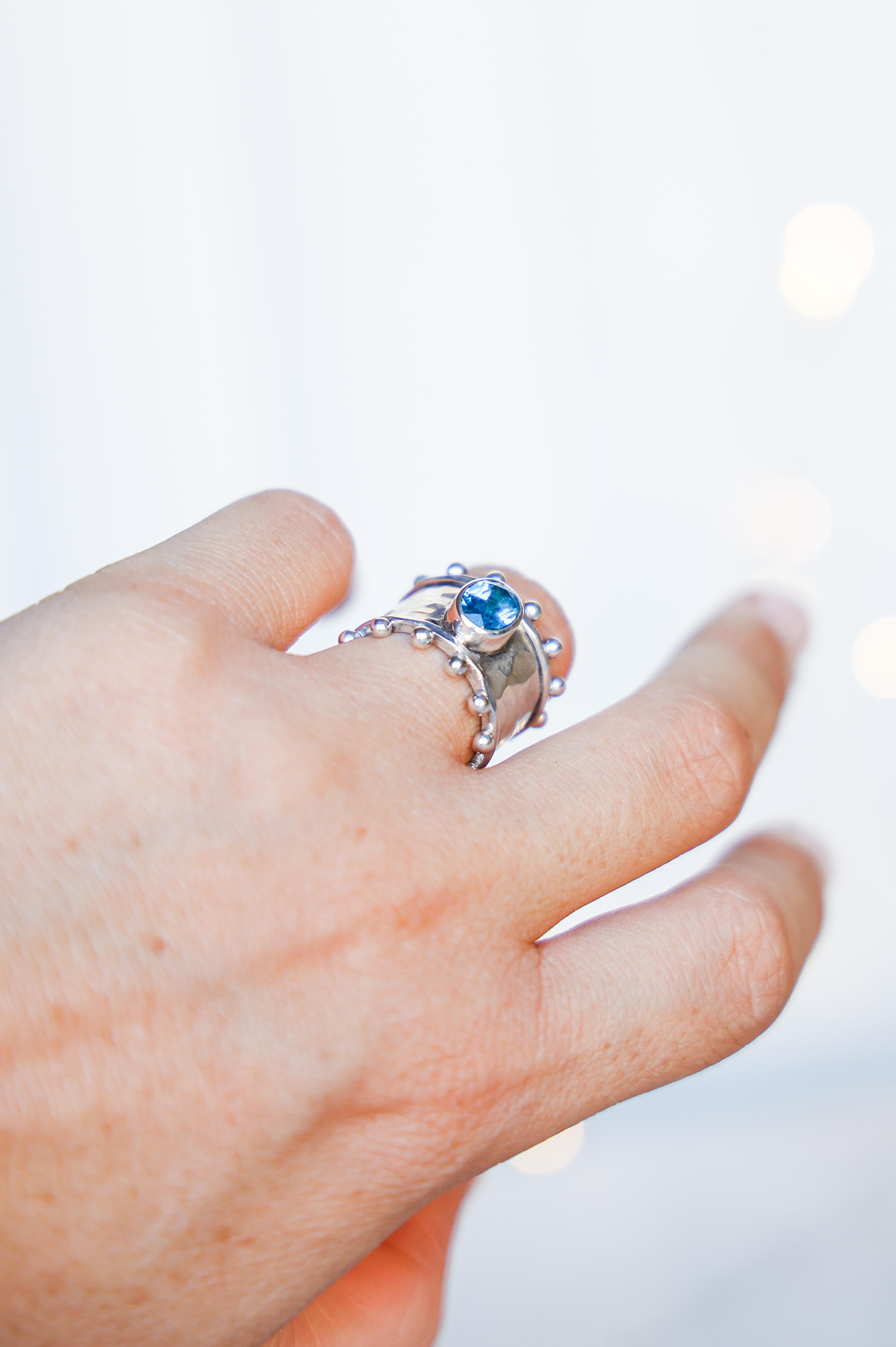 ANILLO ETER DE PLATA Y SWISS TOPACIO CELESTE