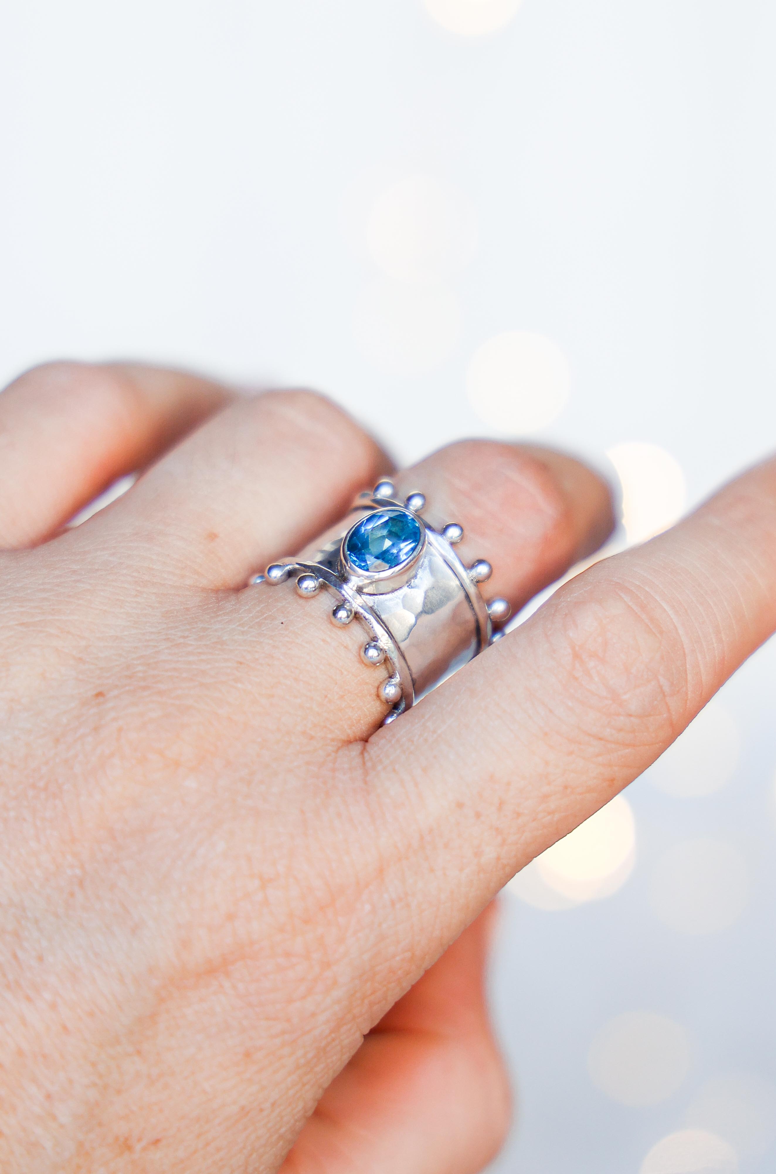 ANILLO ETER DE PLATA Y SWISS TOPACIO CELESTE
