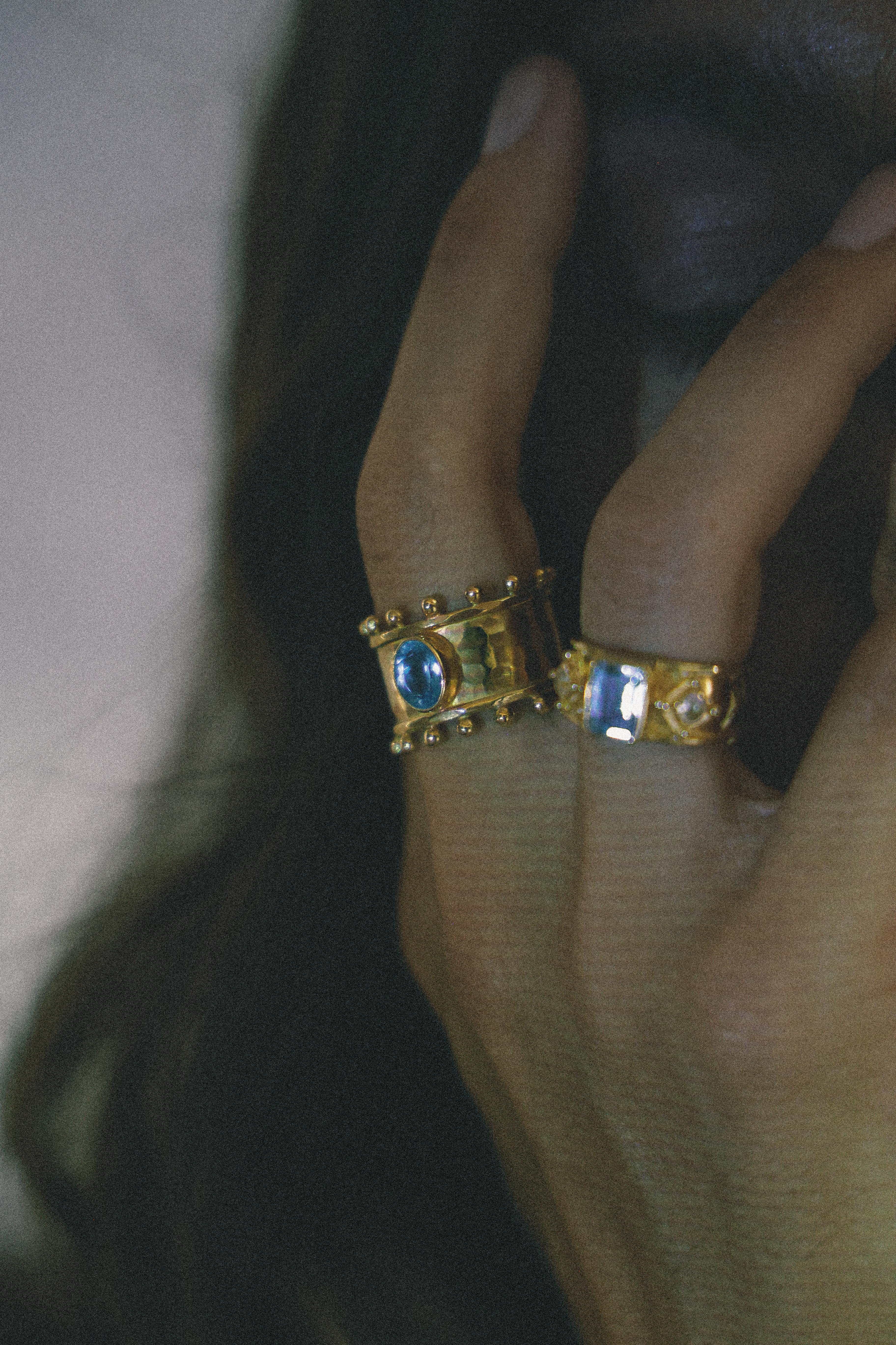 ANILLO ETER GOLD Y SWISS TOPACIO CELESTE