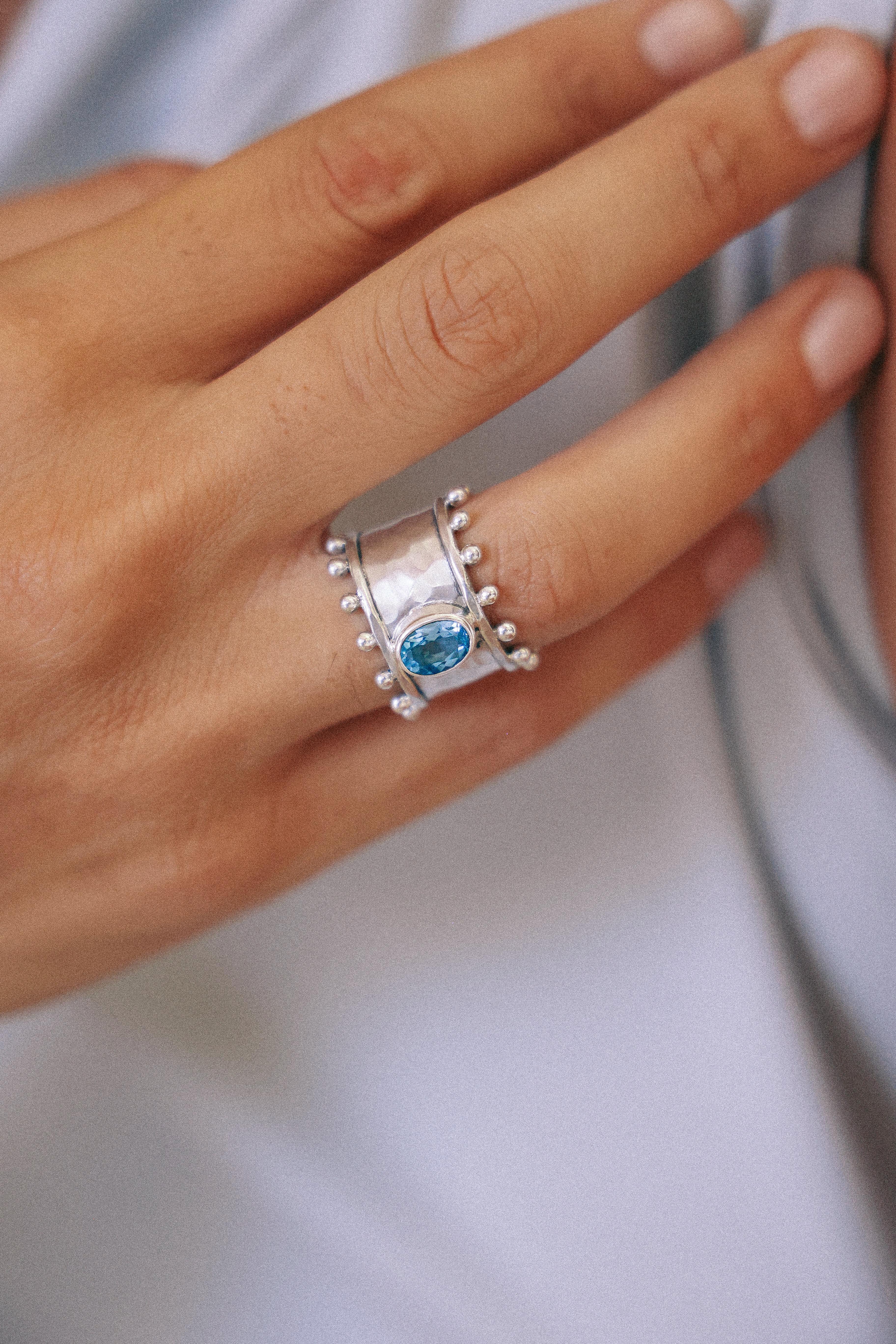 ANILLO ETER DE PLATA Y SWISS TOPACIO CELESTE