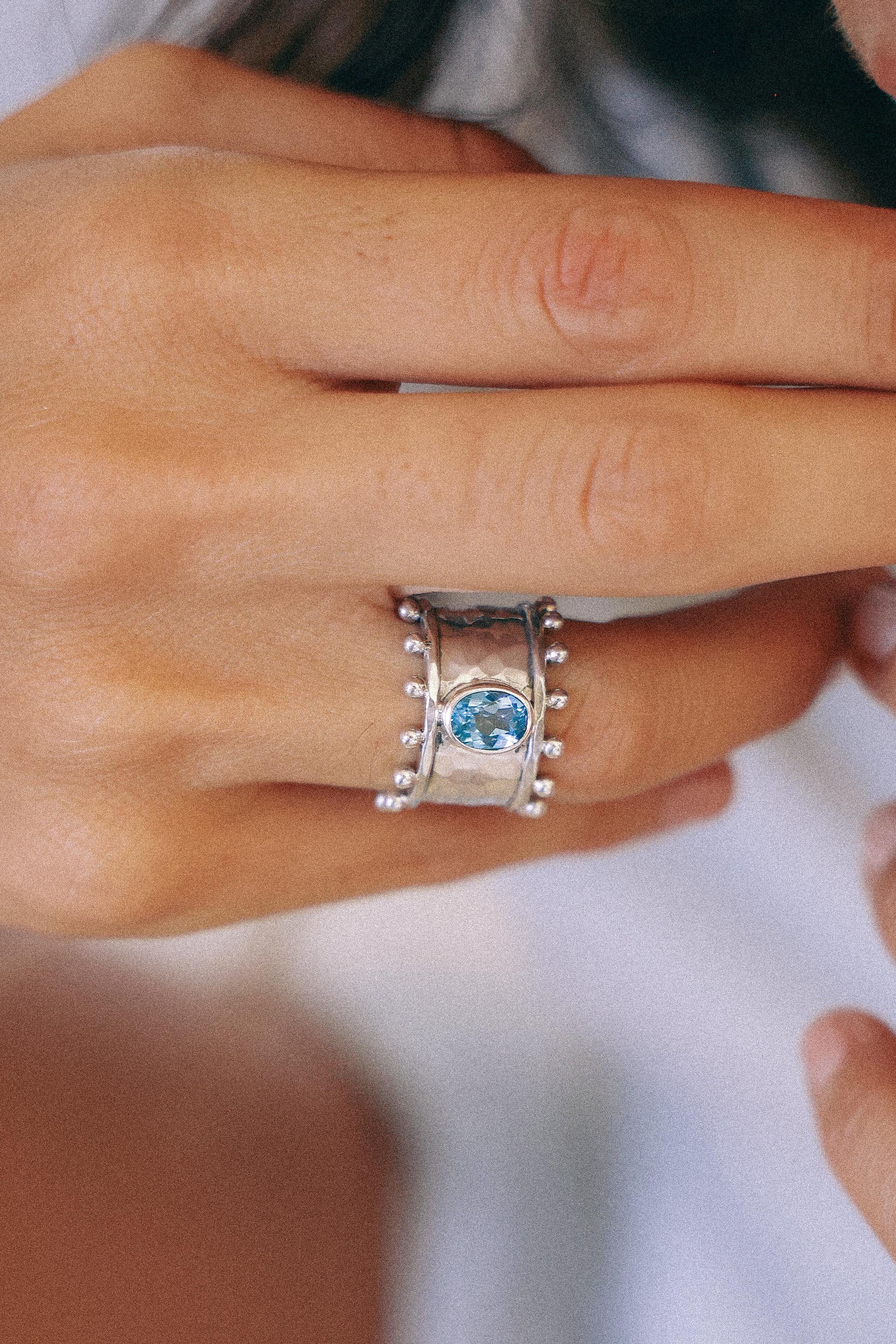 ANILLO ETER DE PLATA Y SWISS TOPACIO CELESTE