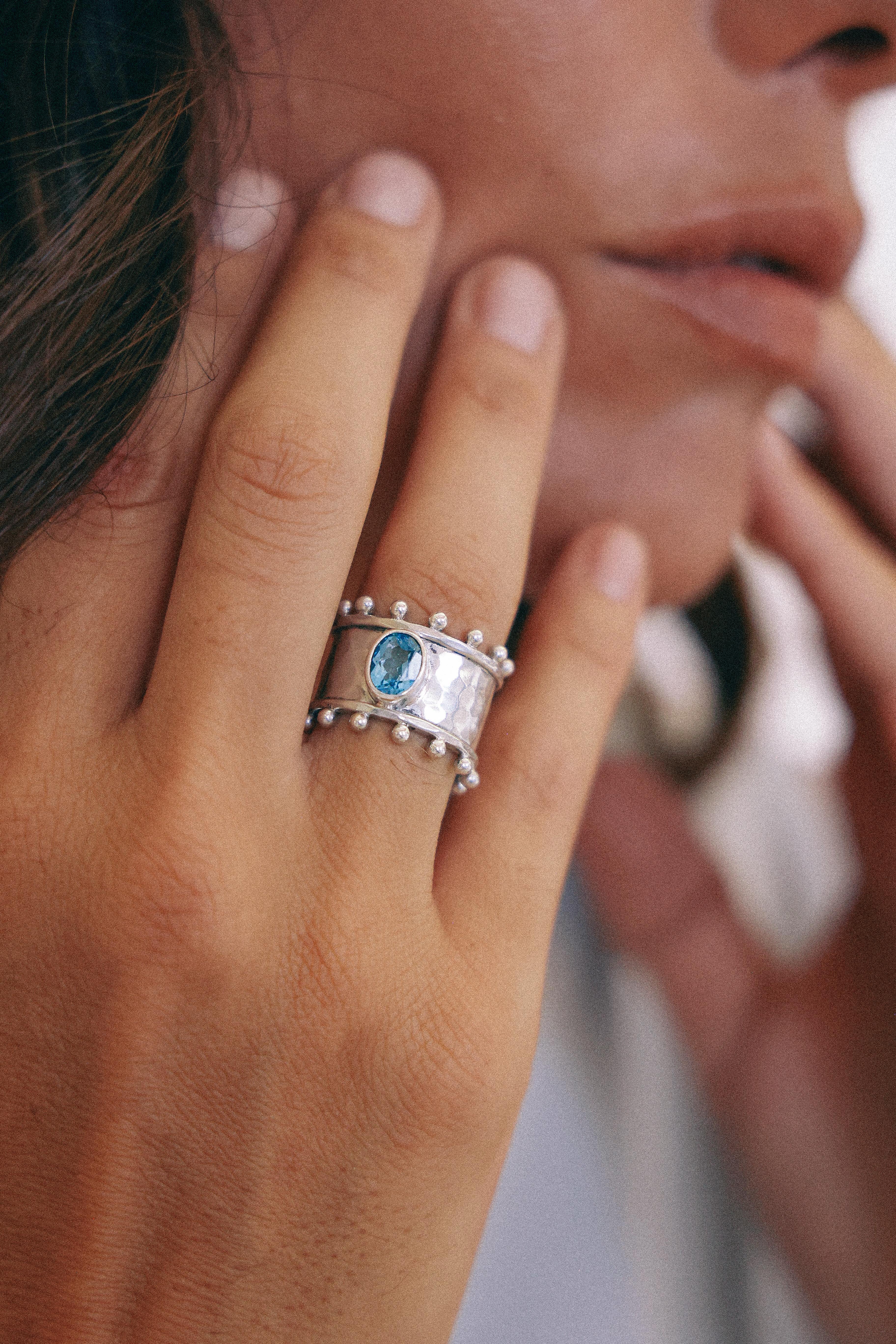 ANILLO ETER DE PLATA Y SWISS TOPACIO CELESTE