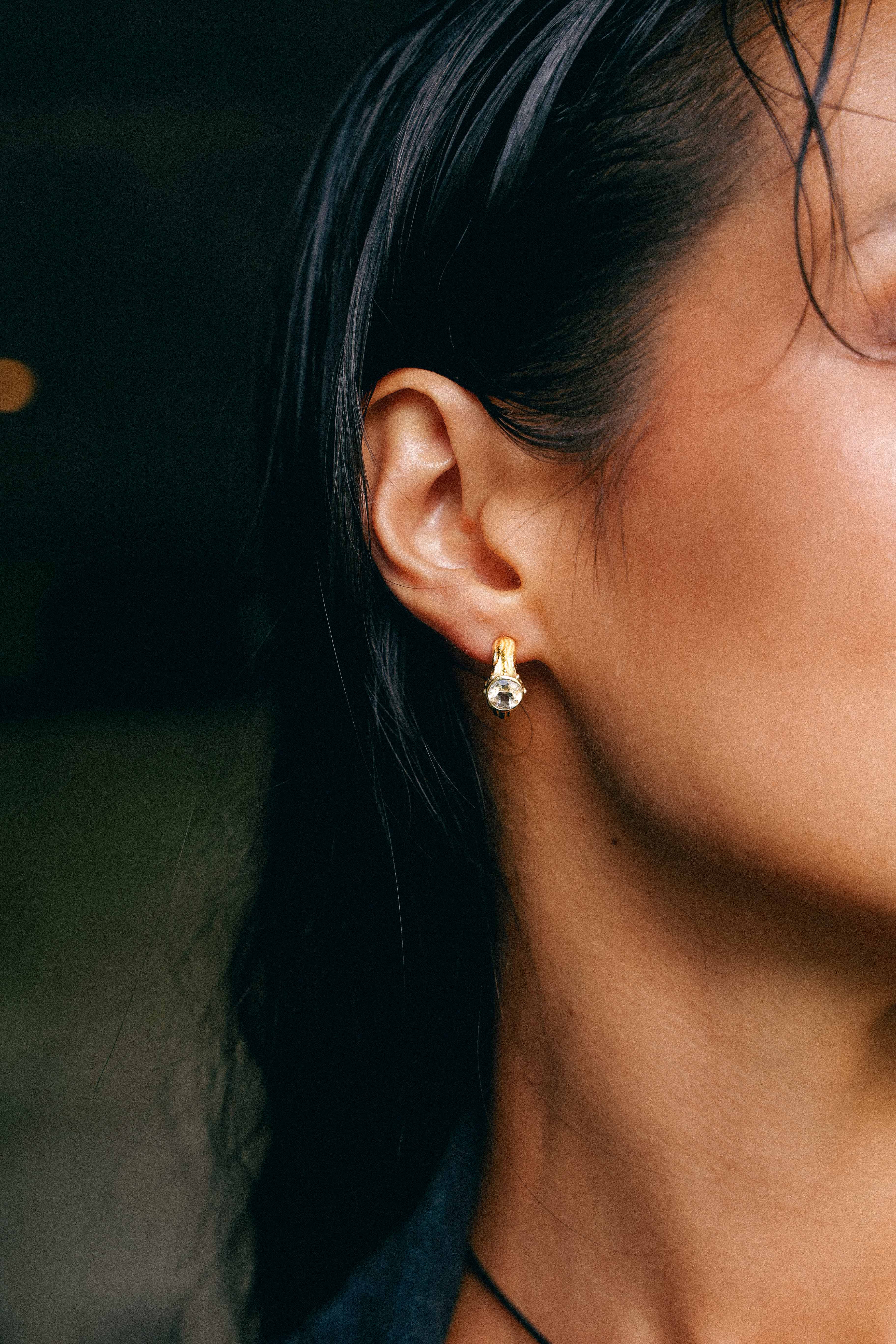 AROS SELES ORO Y TOPACIO BLANCO