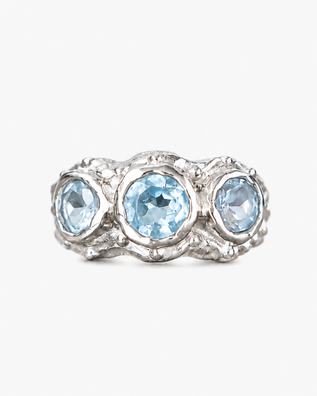 ANILLO SOLENE DE PLATA Y TOPACIOS CELESTES